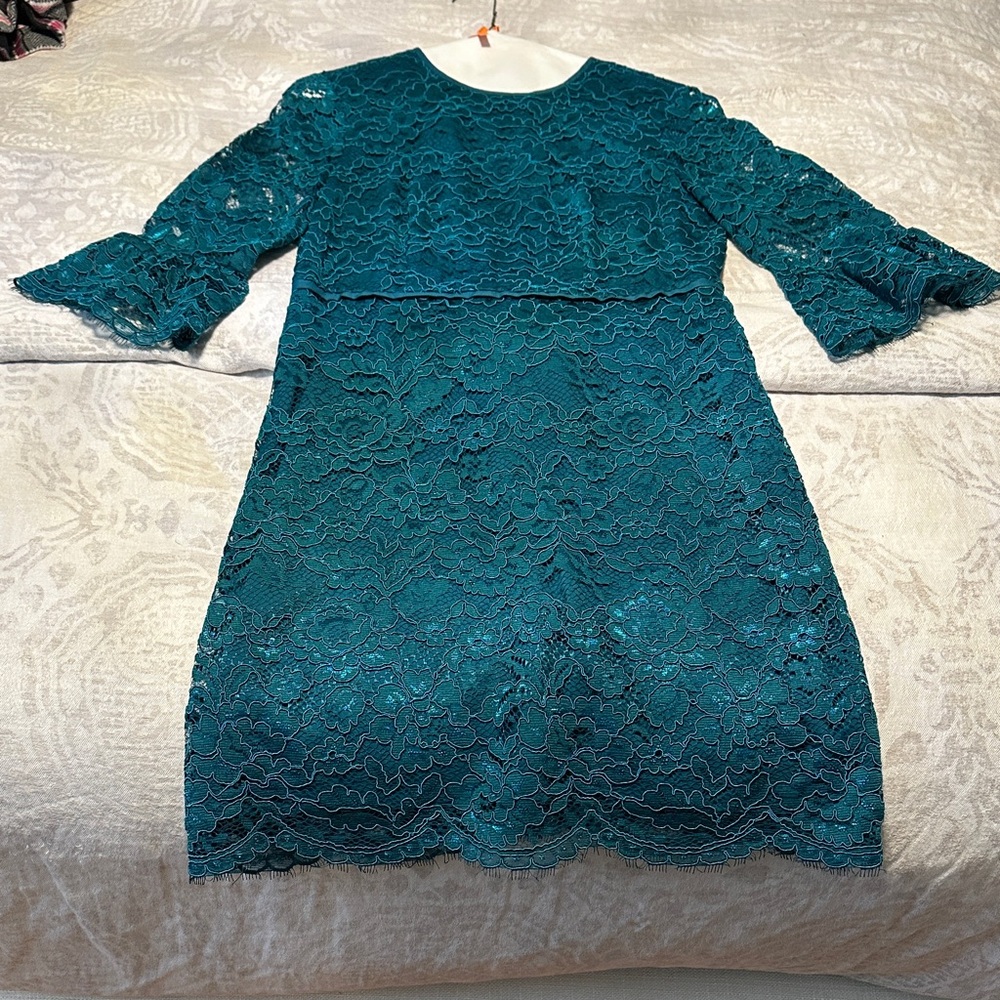Woman’s Teal Lace Dress with Bell Sleeves